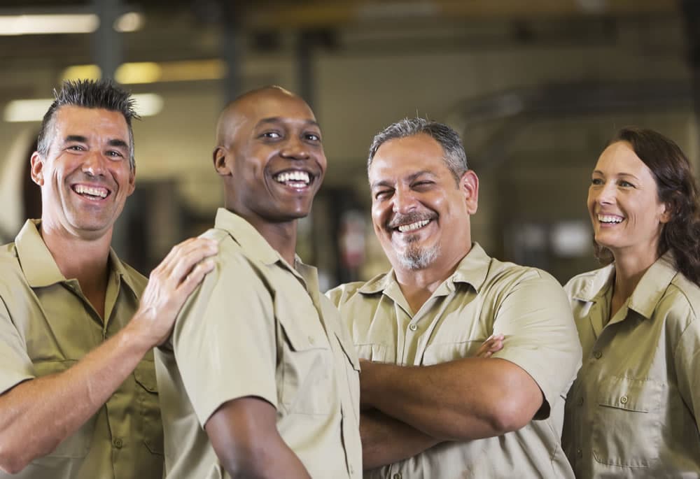 A crew of HVAC service technicians in uniform